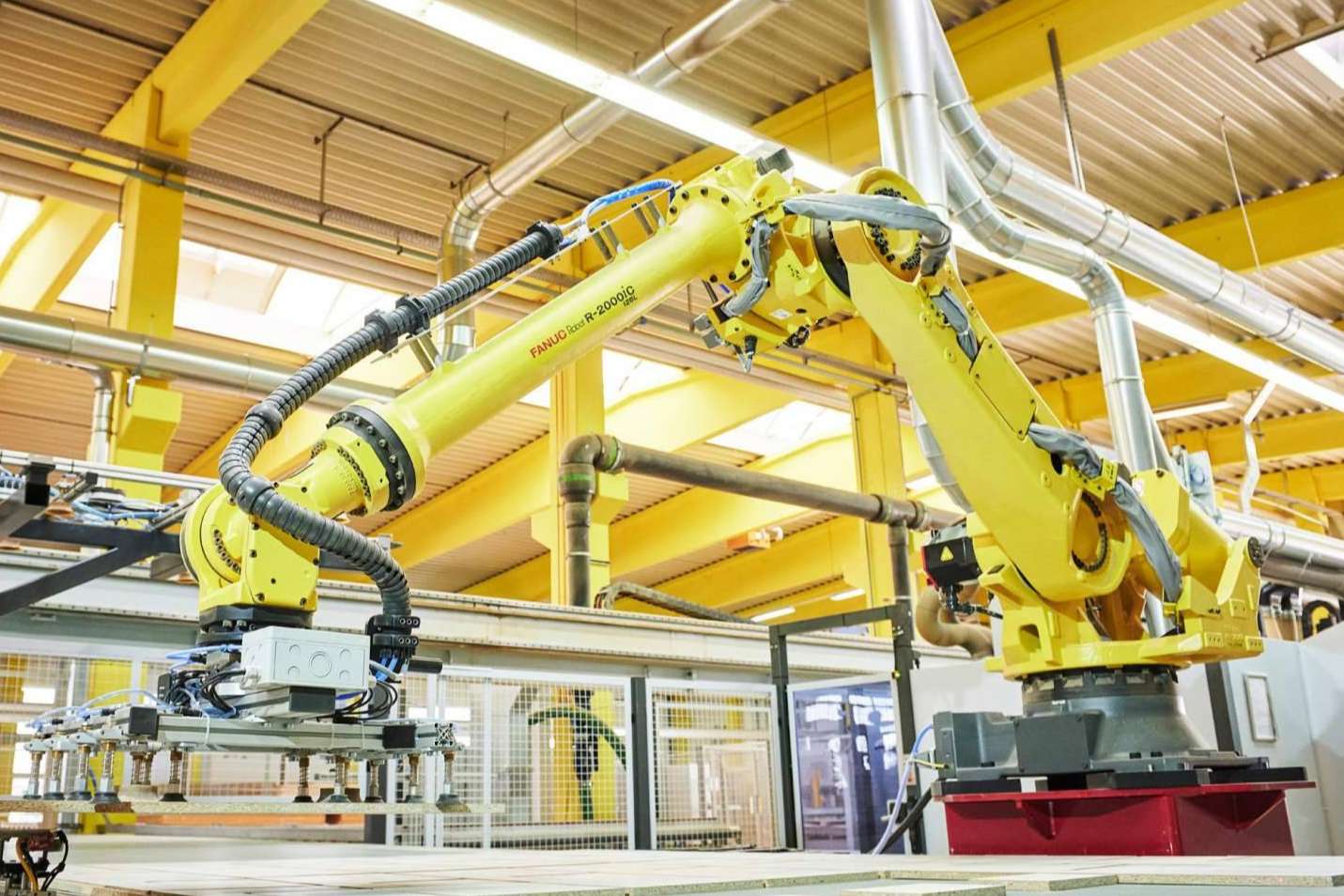 Beneficios de las cadenas portacables triflex para equipar con éxito robots industriales